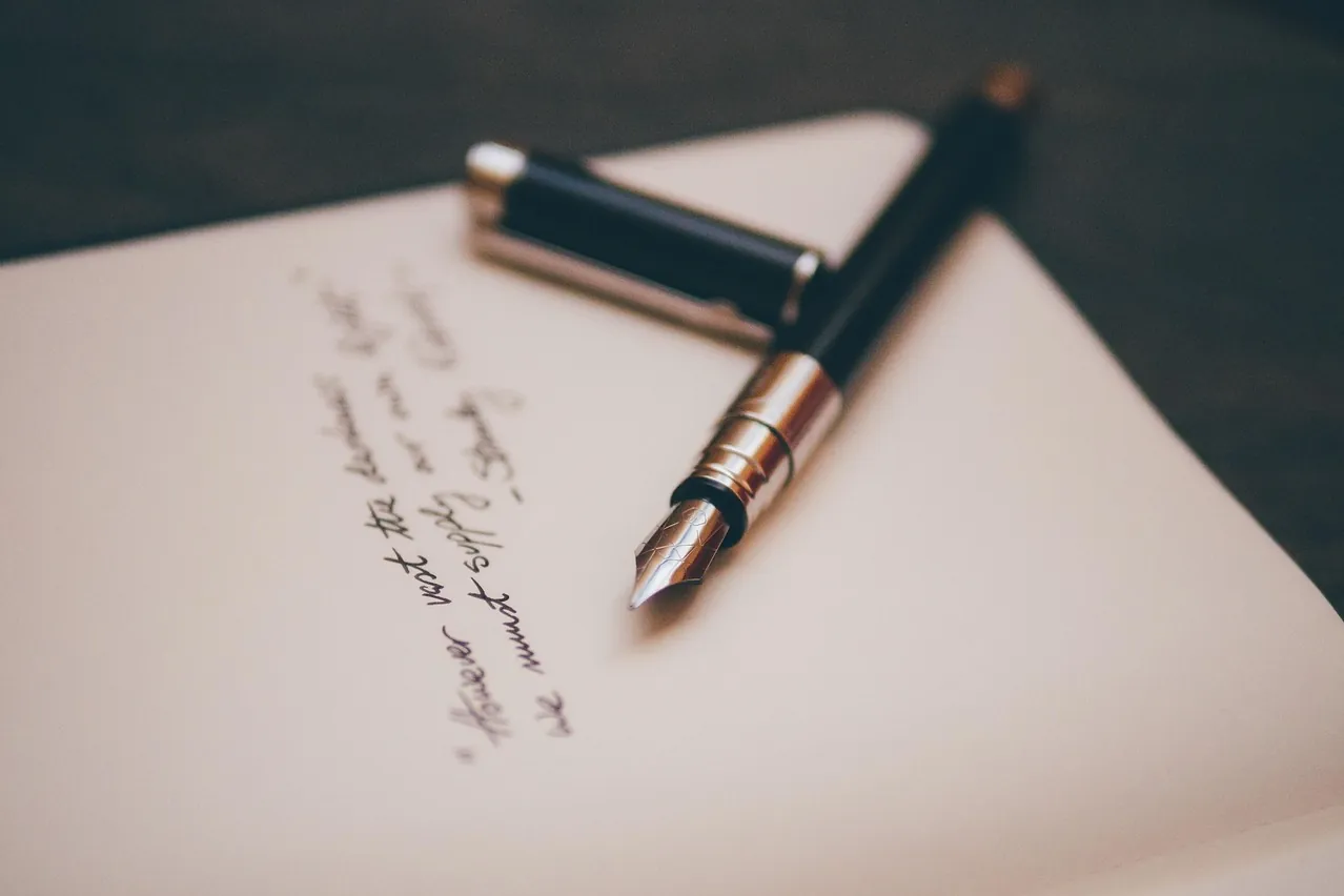 Fountain pen, notebook, paper