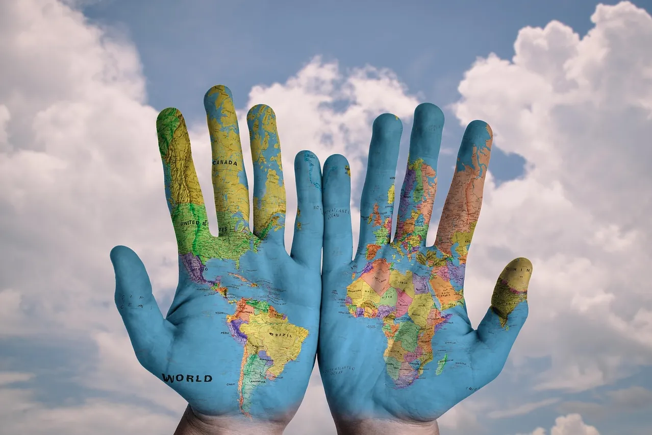 Hands, world, map